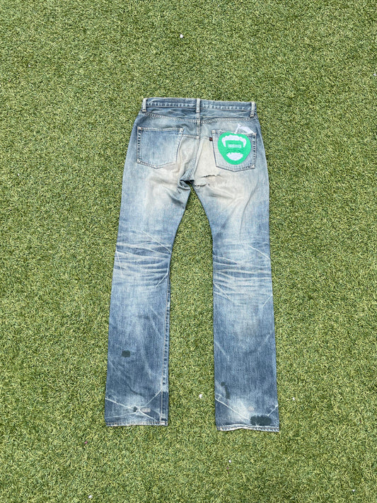 AW07 Undercover Apple Fang Distressed Denim