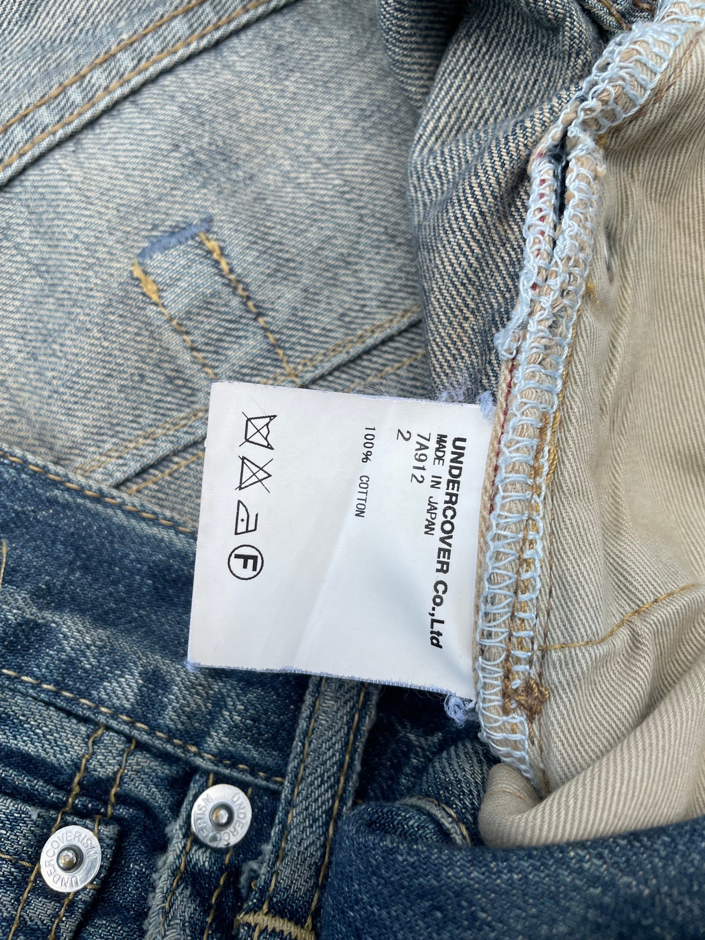 AW07 Undercover Apple Fang Distressed Denim