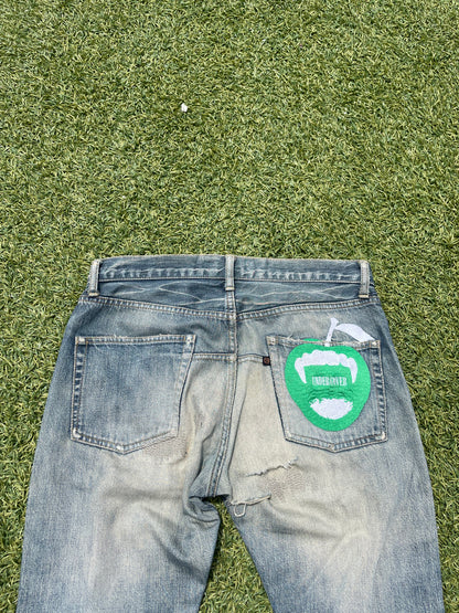 AW07 Undercover Apple Fang Distressed Denim