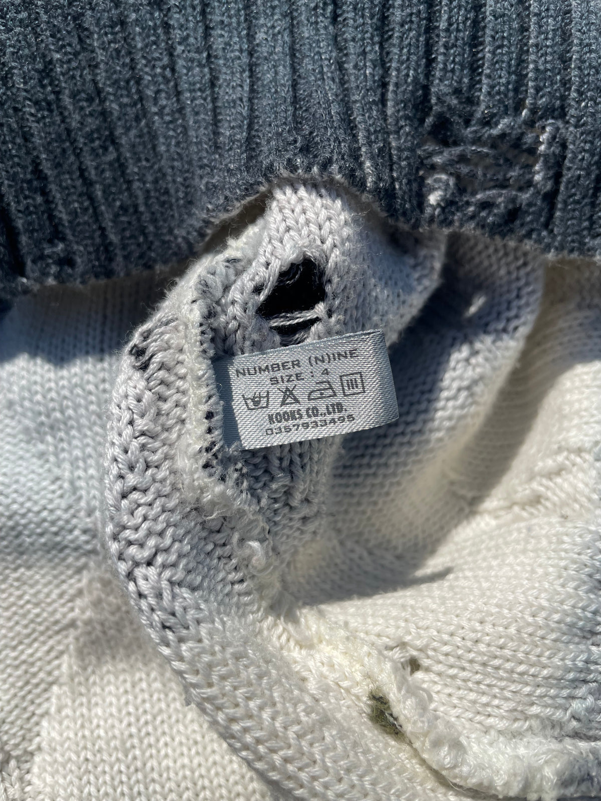 AW02 “Modern Age” - Number (N)ine Distressed Knit Stripe Sweater