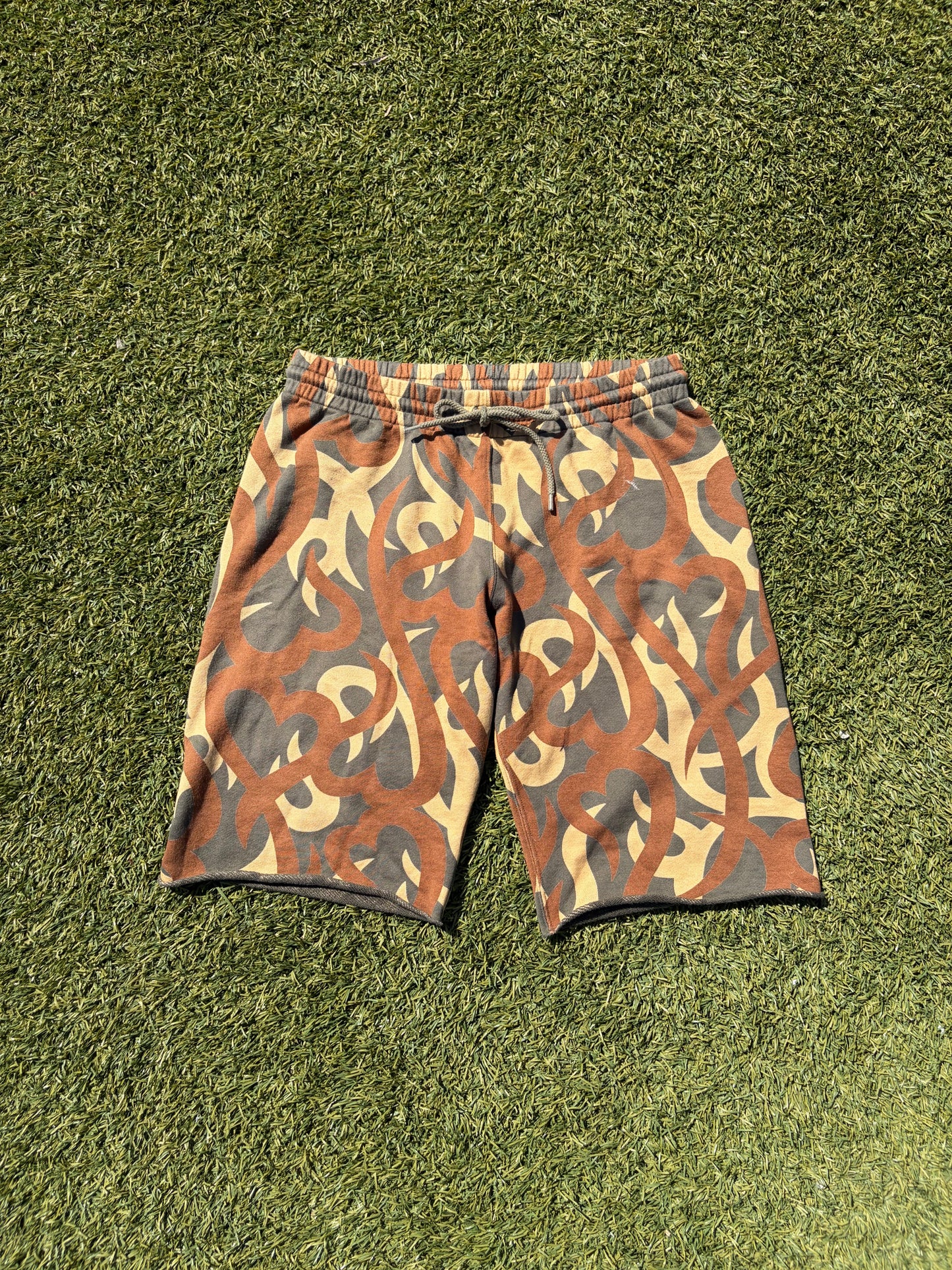 AW04 “Give Peace A Chance” - Number (N)ine Sun Tanned Tribal Camo Shorts
