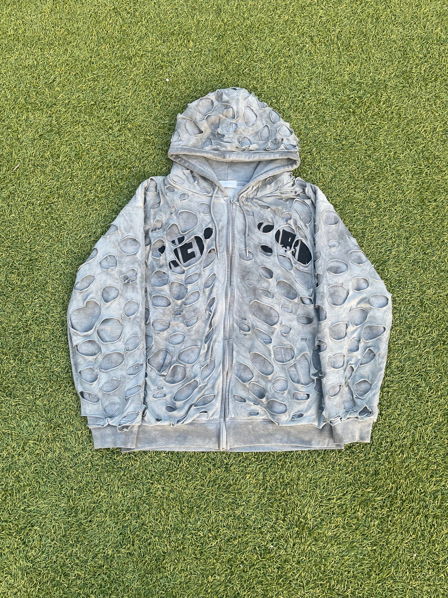 alexander digenova cigarette hoodie ANT/ANTI Scrap zipup in cold oil (patchwork hoodie) Distressing and discoloration throughout Drawstring at hood Zip closure Rubber band and press ALEXANDER DIGENOVA - Black Logo